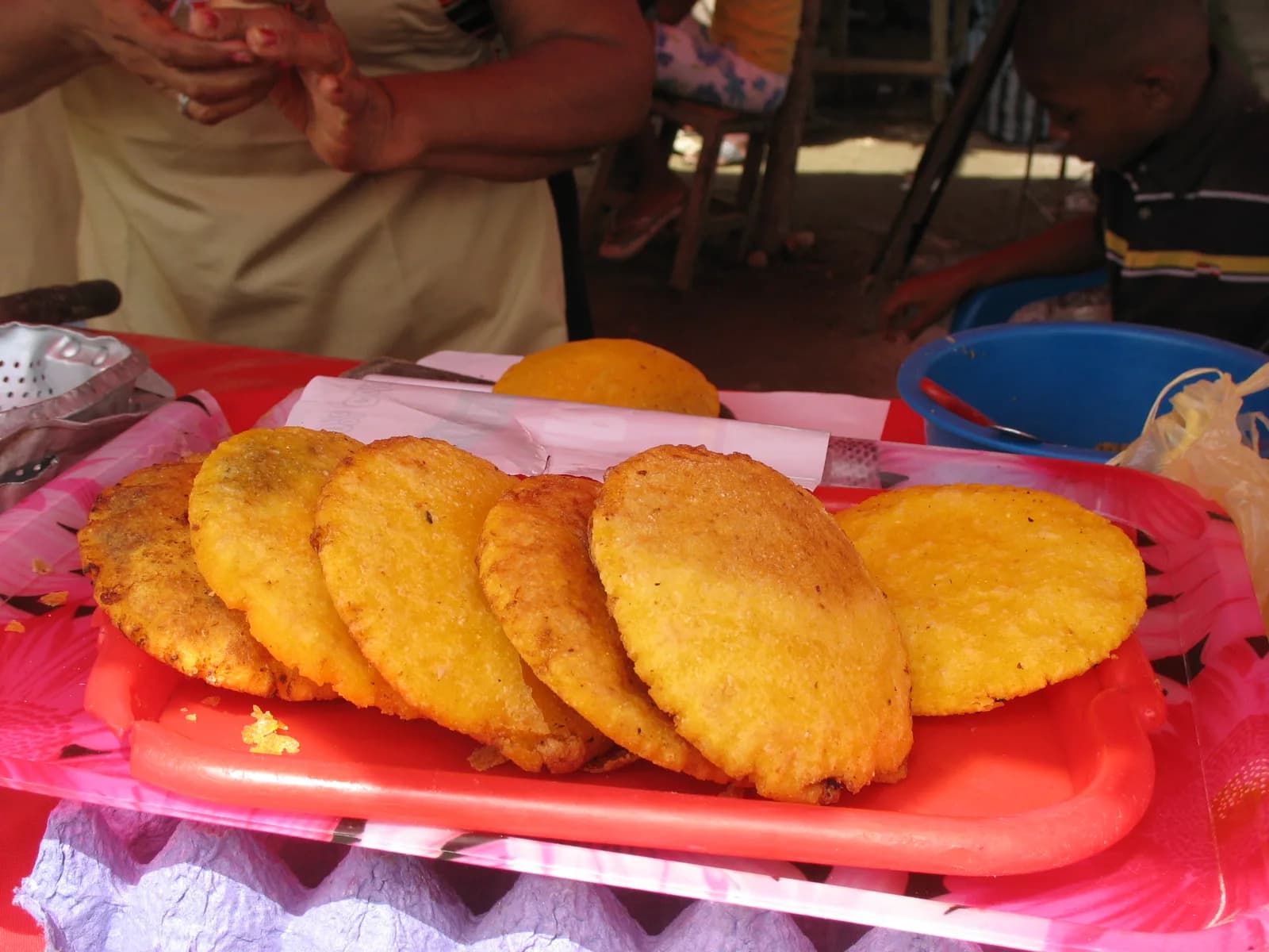Golden fried arepas de huevo, the egg-stuffed corn cakes of Colombia's Caribbean coast
